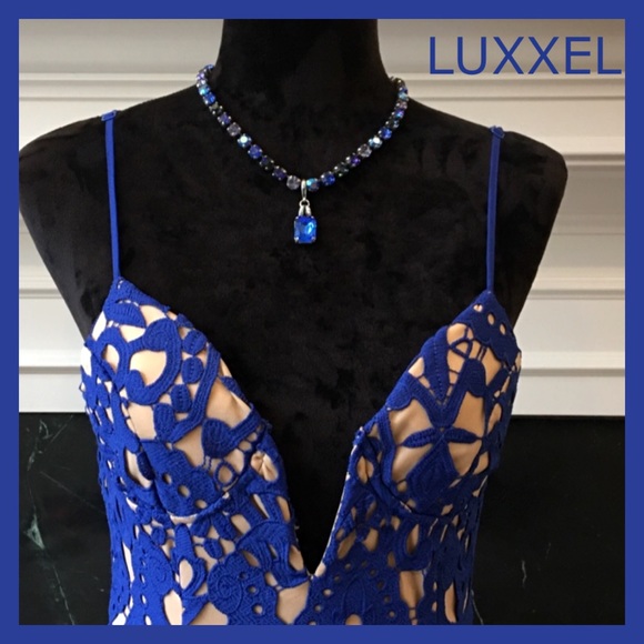 Luxxel Dresses & Skirts - STUNNING BLUE PLUNGING NECKLINE SPAGHETTI STRAP SPECIAL OCCASION DRESS